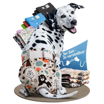 Bunte, hundemusterte Haustierwindeln im 3er-Pack, mit verschiedenen Cartoon-Hunden und einem Etikett, das "3x JUSTIER BAR" liest.