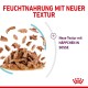 Feuchtfutter mit neuer Textur, zeigt Stücke in Sauce, mit dem Text "Neue Textur mit Häppchen in Sauce" in roter Schrift.