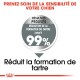 Image promouvant un produit dentaire pour chiens, indiquant "Réduction de la formation du tartre jusqu'à 99%" et "Réduit la formation de tartre."