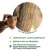 Ein brauner Hund, der neugierig an einem strukturierten Baumstamm schnüffelt, mit Text, der die antibakteriellen und verdauungsfördernden Vorteile der Rinde hervorhebt.