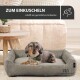 Ein gemütliches Hundebett mit einem Dackel, der ein grünes Halstuch trägt, begleitet von dem Text "ZUM EINKUSCHELN schafft ein gemütliches Ambiente."