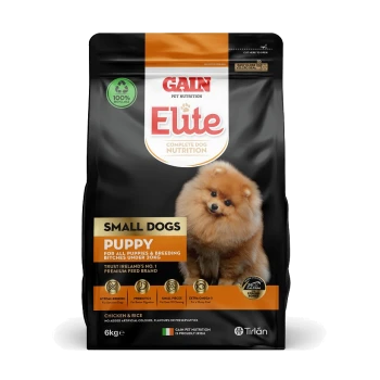 Gain Elite Complete Dog Nutrition for small dogs, 6kg bag with a fluffy Pomeranian puppy. Highlights: "Puppy," "Chicken & Rice," and benefits.