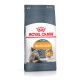 Emballage de nourriture pour chats Royal Canin Hair & Skin, avec un sac gris et une image de chat, mettant en avant le soutien pour une peau et un pelage sains.