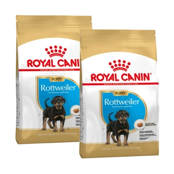 Zwei Beutel Royal Canin Rottweiler Welpenfutter, mit einem jungen Rottweiler-Welpen auf der Vorderseite, beschriftet für Welpen bis zu 10 Monaten.
