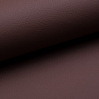 Nahaufnahme von gefaltetem braunem strukturiertem Leder.