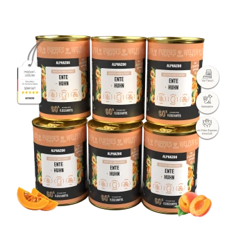 Sechs Dosen Alphazoo Enten- und Hühnernassfutter für Welpen mit Kürbis- und Aprikosenbildern und Produktetiketten.