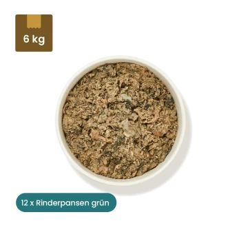 Hundfutterverpackung mit dem Etikett "Rinderpansen grün, 500g" und Nährwertangaben, neben einer Schüssel mit dem Futter.