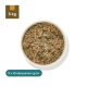 Hundfutterverpackung mit dem Etikett "Rinderpansen grün, 500g" und Nährwertangaben, neben einer Schüssel mit dem Futter.