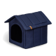 Navyblaue Tierhaus mit schrägem Dach, mit einem vorderen Eingang und einem braunen Lederakzent.