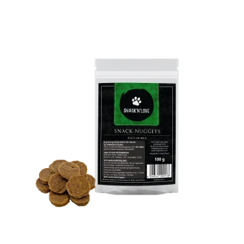 Snack'n'Love Snack-Nuggets pour chiens, paquet de 100g, avec des friandises circulaires brunes et des informations nutritionnelles en allemand.