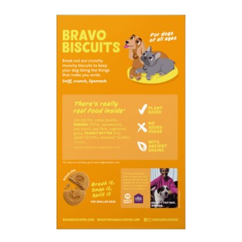 Haustierfutter-Werbung für "Bravo Biscuits" mit Cartoon-Hunden auf gelbem Hintergrund. Pflanzlich, ohne Zuckerzusatz, mit Hafer und alten Getreidesorten.