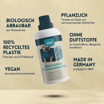 Flasche mit Waschmittel für Hundekleidung, beschriftet mit "Waschmittel für Hundekleidung", mit umweltfreundlichen Ansprüchen und einem Hundebild.