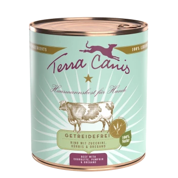 Dose mit Terra Canis Hundefutter mit einer Kuhillustration, beschriftet "Getreidefrei" mit "Rindfleisch mit Zucchini, Kürbis & Oregano."