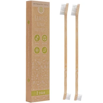 Bambus-Hundezahnbürsten in einer recycelbaren Box, mit zwei Bürsten mit weichen Borsten, beschriftet mit "Bambus Hunde Zahnbürste."