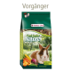 Un sac de nourriture pour lapins Versele-Laga Cuni junior Nature avec un lapin marron et blanc sur le devant, entouré de légumes colorés.