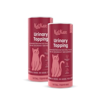 Zwei rosa KatKare 'Urinary Topping'-Dosen (Katzenergänzung) mit Katzenillustration und 'Vital-Topping'-Aufkleber.