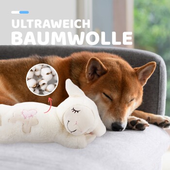 Schlafender brauner Hund auf einem grauen Sofa mit einem weißen Plüschtier und dem Text „ULTRAWEICH BAUMWOLLE“ sowie einer Baumwoll-Nahaufnahme.