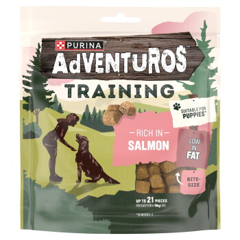 Purina Adventuros Training dog treats pouch reading "Rich in Salmon", "Suitable for Puppies", "Low in Fat", bite-size pieces
