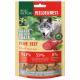 Freeze-dried beef snack for dogs, featuring a wolf on the packaging, with text highlighting 94.1% beef, 5.9% fruits and herbs, and 0% grains.