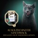 Sheba Sauce Collection Katzenfutterverpackung mit Fleischstücken in Soße, beschriftet mit "mit Kalbshäppchen in heller Sauce," 85g.