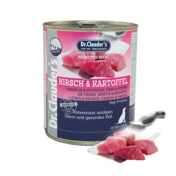 Dose mit Haustierfutter mit der Aufschrift "Dr. Clauder's Hirsch & Kartoffel," mit Wild und Kartoffeln, mit Fleischstücken daneben.