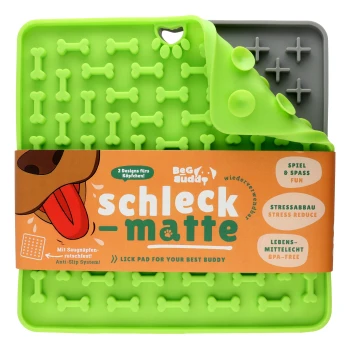 Grüne Silikonleckmatte mit Knochenmustern, mit einem Etikett, das "Beg Buddy Schleck-Matte" liest und Stressabbau sowie BPA-frei hervorhebt.
