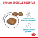 Bild von Haustierfutter-Kibble mit dem Text 'URINARY SPEZIELLE REZEPTUR', das den ausgewogenen Mineralgehalt und den niedrigen Urin-pH-Wert hervorhebt.