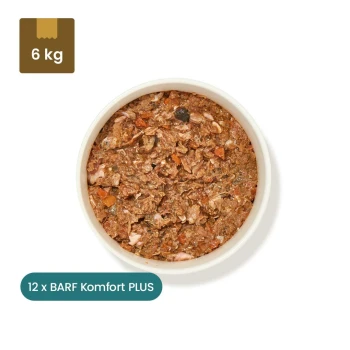 Gefrorenes Tierfutterpaket mit der Aufschrift "BARF Komfort PLUS Lachs, 500 g" mit einer Schüssel des Futters, die Stücke von Lachs und Gemüse zeigt.