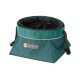 Teal zusammenklappbarer Fressnapf von Ruffwear, mit einem Kordelzugverschluss und einem grauen Logo-Patch mit einer Hundillustration.