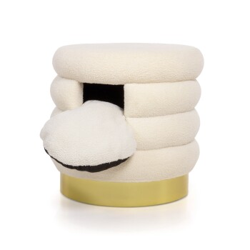 Ein gemütliches, cremefarbenes Haustierbett in Form einer Ente mit einem plüschigen, schwarz gefütterten Eingang und einem weichen, runden Schnabel.