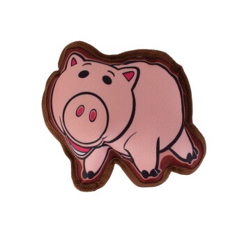 Pink pig-shaped plush pet toy with brown border and cartoon face on black background