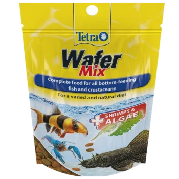 Tetra Wafer Mix pet food package, featuring colorful fish illustrations, labeled as complete food for bottom-feeding fish and crustaceans.