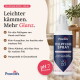 Eine Flasche Pawlie's Fellpflege Spray mit dem Etikett "100% natürliche Inhaltsstoffe" steht neben einer schlafenden Katze. Text: "NATÜRLICHE PFLEGE OHNE PARFÜM."