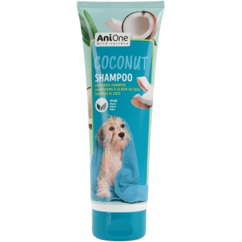 Tube de shampooing AniOne à la noix de coco pour animaux avec images de noix de coco, inscriptions « COCONUT SHAMPOO » et « VEGAN », chiot mouillé enveloppé dans une serviette bleue.
