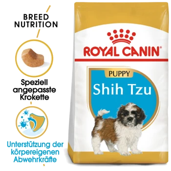 Royal Canin Puppy Shih Tzu Hundefutterbeutel mit einer Illustration eines kleinen Shih Tzu-Welpen, mit Text, der die Ernährungsbedürfnisse der Rasse und die Unterstützung des Immunsystems hervorhebt.