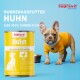 Dosen Supravit Huhn Nassfutter für Hunde mit braunem Hund und deutschem Text, der natürliche Zutaten, Vitamine, getreidefrei, Qualität und schonende Verarbeitung hervorhebt.