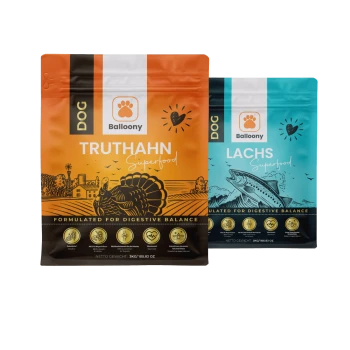 Zwei Balloony-Hundefutterpakete: eines orange "TRUTHAHN Superfood" und eines blau "LACHS Superfood," beide für die Verdauungsbalance.