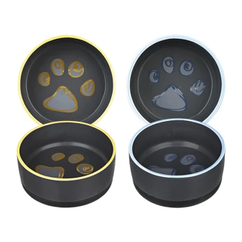 Drie huisdierkommen in zwart met kleurrijke randen: één geel, één blauw en één met een pootafdruk ontwerp.