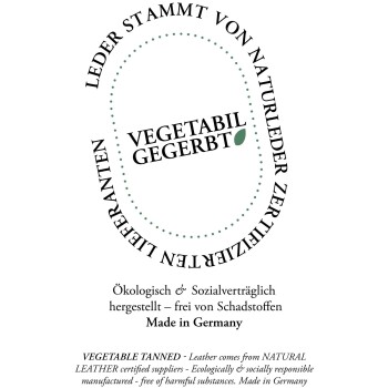 Etikett mit dem Text "VEGETABIL GEGERBT" und "Ökologisch & Sozialverträglich", das auf pflanzlich gegerbtes Leder hinweist, hergestellt in Deutschland.