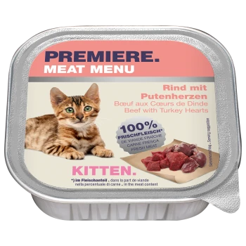 Ein braun gestreifter Kätzchen schaut den Betrachter auf der Verpackung des "Premiere Meat Menu" an, das Rind- und Truthahnherzen zeigt, gekennzeichnet mit "100% Frischfleisch."