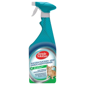 Butelka sprayu Simple Solution Cat Stain & Odour Remover, z grafiką zabawnego kociaka, z tekstem w języku niemieckim i angielskim.