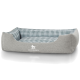 Graues Hundebett mit einem blau-weißen Karomuster, mit dem Logo "KNUFFELWUFFF" auf der Vorderseite.
