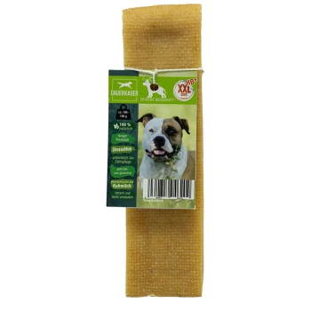 Käsekauknochen XXL HB Hundekau-Stick mit Verpackung, die einen lächelnden Hund zeigt, mit der Aufschrift "DAUERKAUER", die natürliche Zutaten und Stressabbauvorteile hervorhebt.
