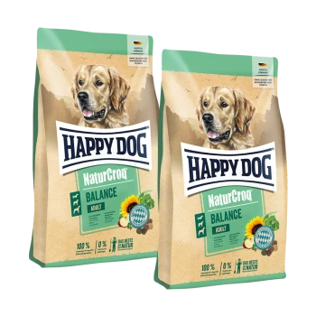 Deux sacs de nourriture pour chiens Happy Dog NaturCroq Balance Adult avec une image de golden retriever et un graphique de tournesol.