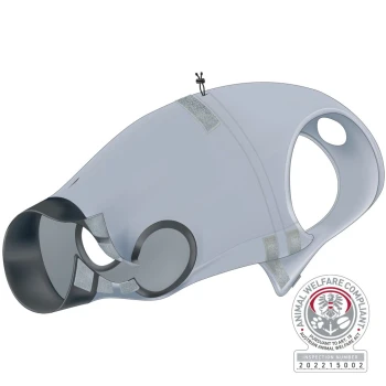 A gray pet muzzle with a black interior, featuring Velcro straps for adjustment, and an animal welfare compliance seal in the corner.