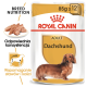 Opakowanie karmy dla dorosłych jamników Royal Canin, z zdjęciem jamnika, z tekstem podkreślającym żywienie rasy i wsparcie stawów.