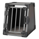 Eine robuste, graue Transportbox für Haustiere mit Metallstangen und einem sicheren Riegel, entworfen für den sicheren Transport von Haustieren.