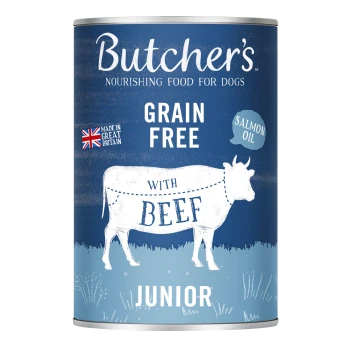 Puszka karmy dla psów Butcher's z niebieskim wzorem, oznaczona "Bez zbóż z wołowiną" i "Junior", z ilustracją krowy i wzmianką o oleju z łososia.