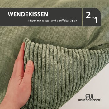 Wendekissen in grün, zeigt glatte und geriffelte Optik, mit Text '2 in 1' und 'Kissen mit glatter und geriffelter Optik'.