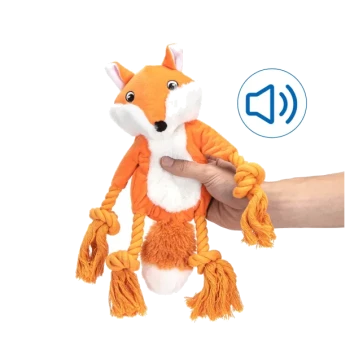 Ein plüschiger orangefarbener Fuchsspielzeug mit Seilarmen, gehalten von einer Hand, mit einem Geräuschsymbol, das anzeigt, dass es Geräusche macht.